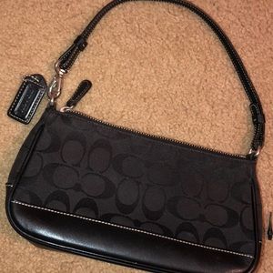 Black coach hand bag